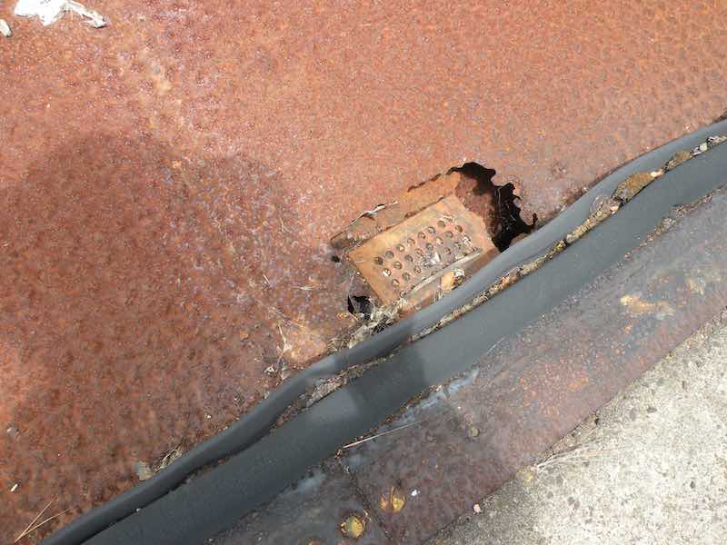 C mag elevator door drain rust